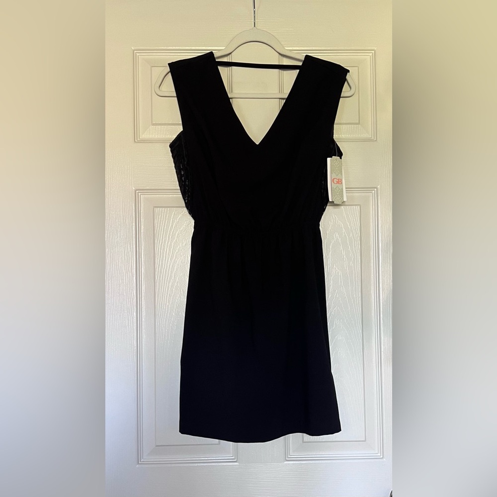GB Black V-Neck Mini Dress with tie back and lace detail. Size S